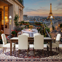 Dusk over Paris fills a dining room beside the Sunset Romance wall mural.