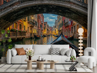 Stone arch and gondola scenery give this lounge a calm Venice wall mural backdrop.