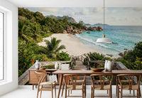 Boardwalk-to-shore scenery keeps a Dining room calm with this wall mural