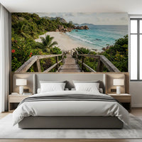 Palms, ferns and red hibiscus edge the path in this Turquoise Shores wall mural