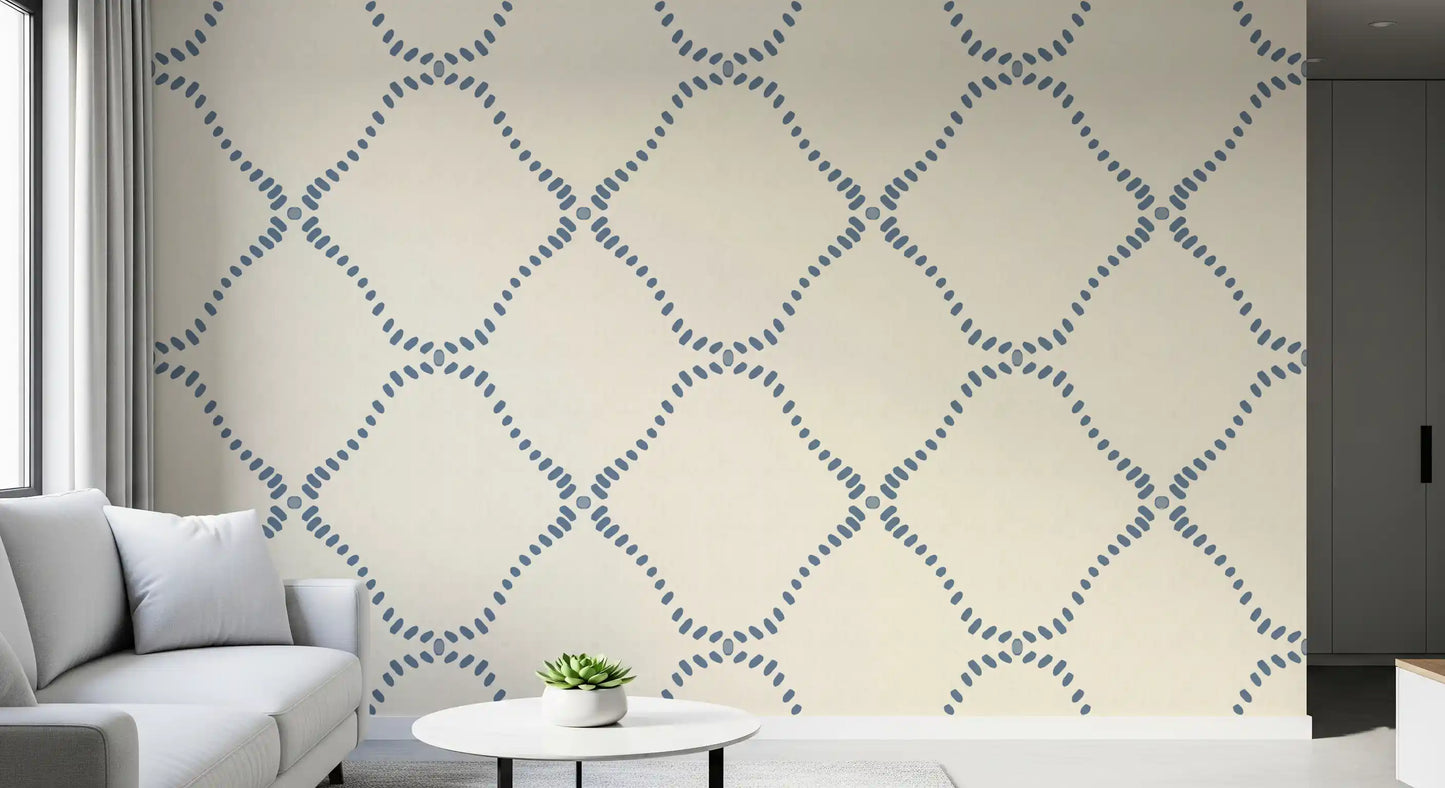 A slate-blue diamond trellis warms the lounge in this Beachy Boho wallpaper.