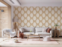 An easy beachy mosaic relaxes the lounge in this golden dotted wallpaper