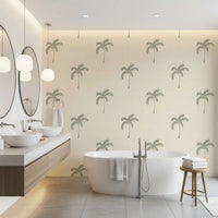 Pale cream and sage palms freshen a bathroom with this beachy wallpaper