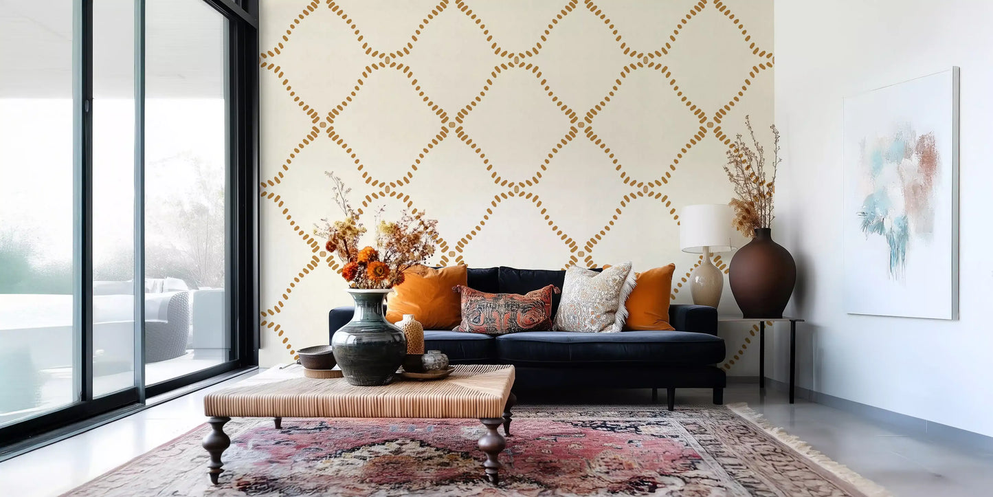 A calm gold trellis quiets a Living room in this Beachy Boho wallpaper.
