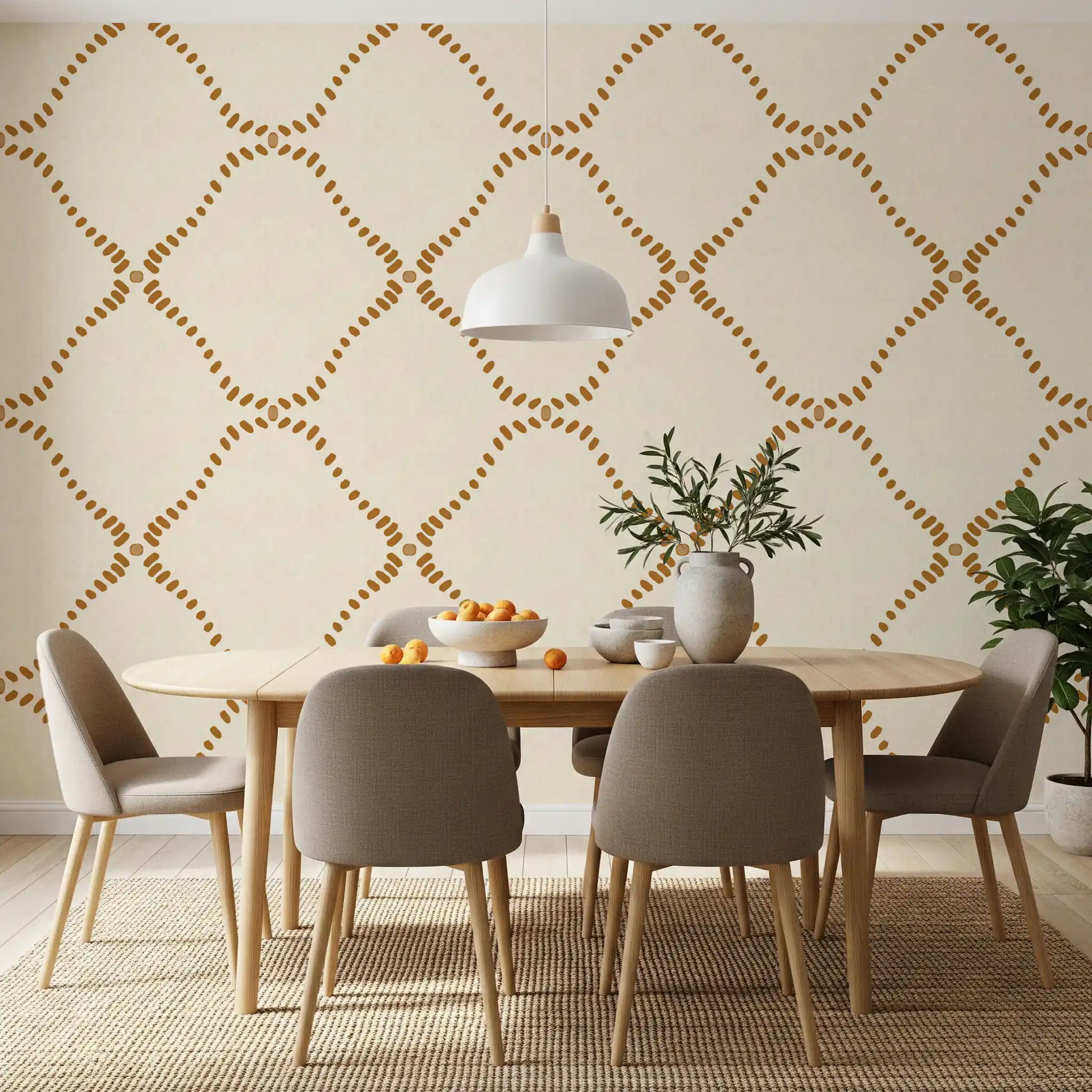 Clusters of gold dabs taper toward each diamond point on this Boho wallpaper.