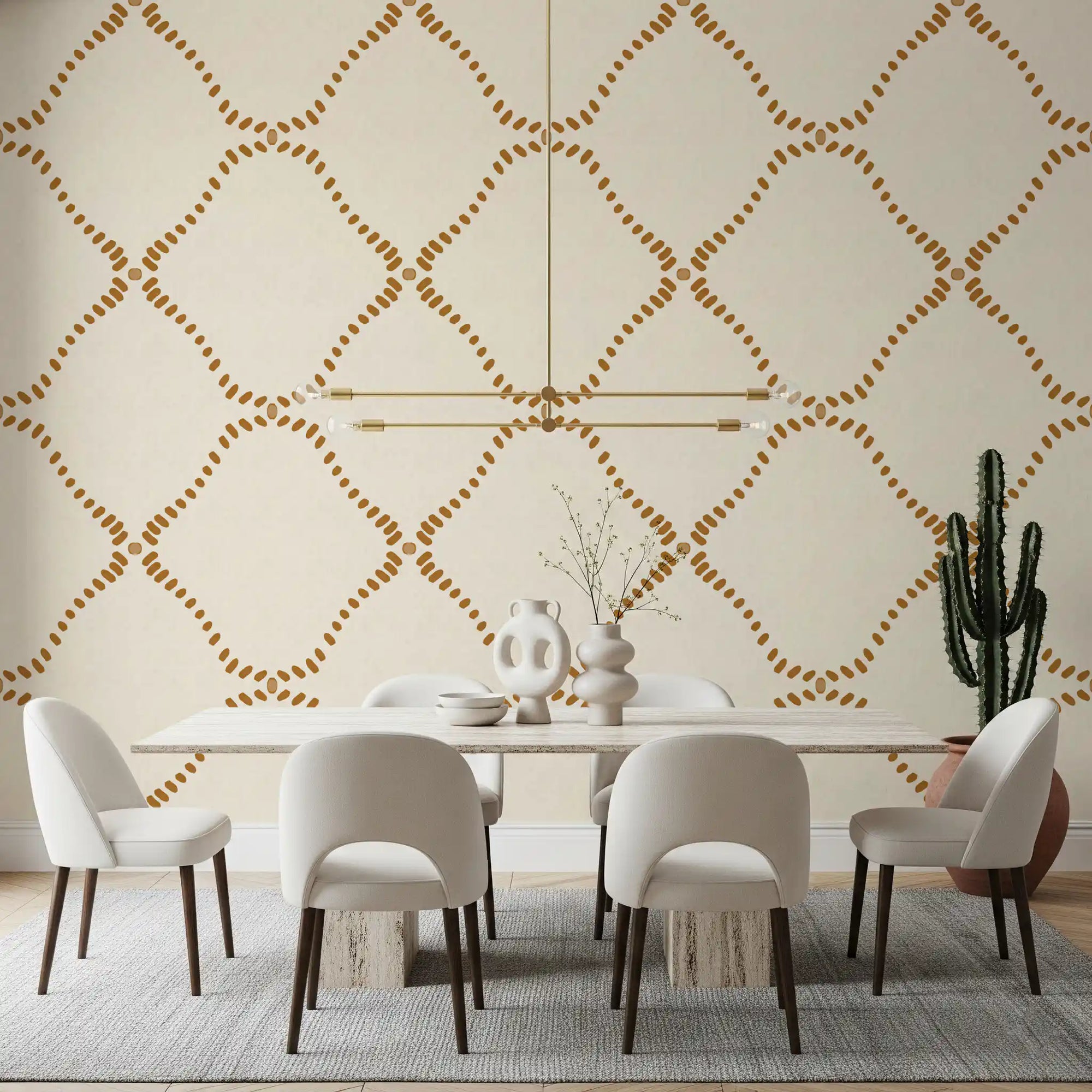 Warm gold diamonds lend a sunny boho note to a dining room in this Lattice wallpaper.