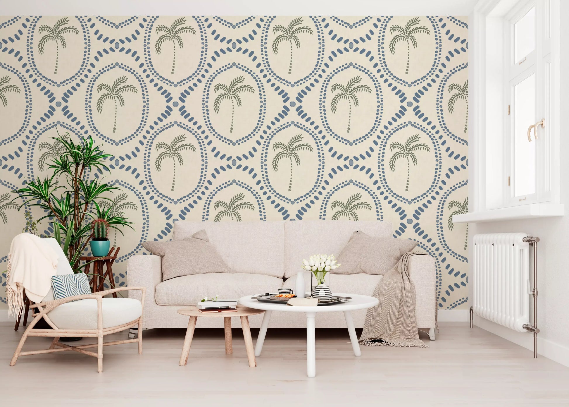 A breezy oasis of sage palms warms this lounge with slate-blue boho wallpaper