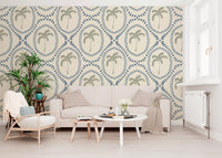 A breezy oasis of sage palms warms this lounge with slate-blue boho wallpaper