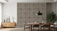 Observing the block print texture on this charcoal brown Japandi wallpaper sample.