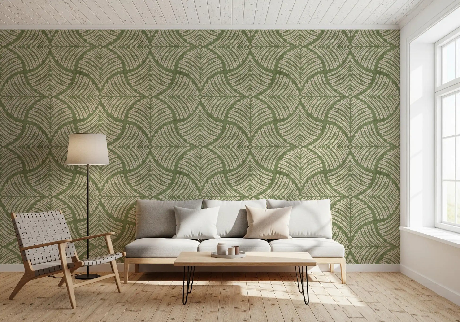Cozy lounge area accented by a textured green minimalist wallpaper.