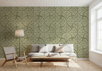 Cozy lounge area accented by a textured green minimalist wallpaper.