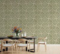 Olive fan motif anchoring a serene dining room as Japandi-style wallpaper.