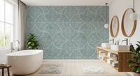Bathroom wrapped in dusty blue fan scallop wallpaper with a textured ground