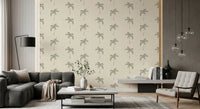 Painted tree motifs stand out on this beige Palms wallpaper.
