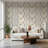 Cozy lounge layout enriched through the Tropical Palm Deco Stripes Slate Blue Wallpaper.