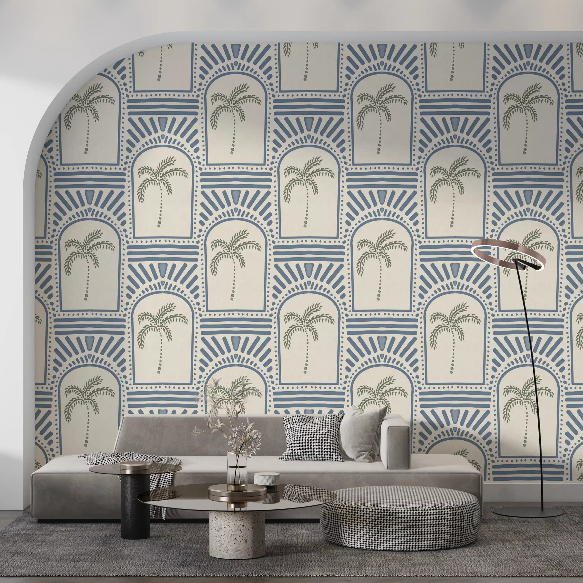 Tropical palm art deco archways slate blue wallpaper showing green leaves.