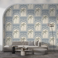 Tropical palm art deco archways slate blue wallpaper showing green leaves.