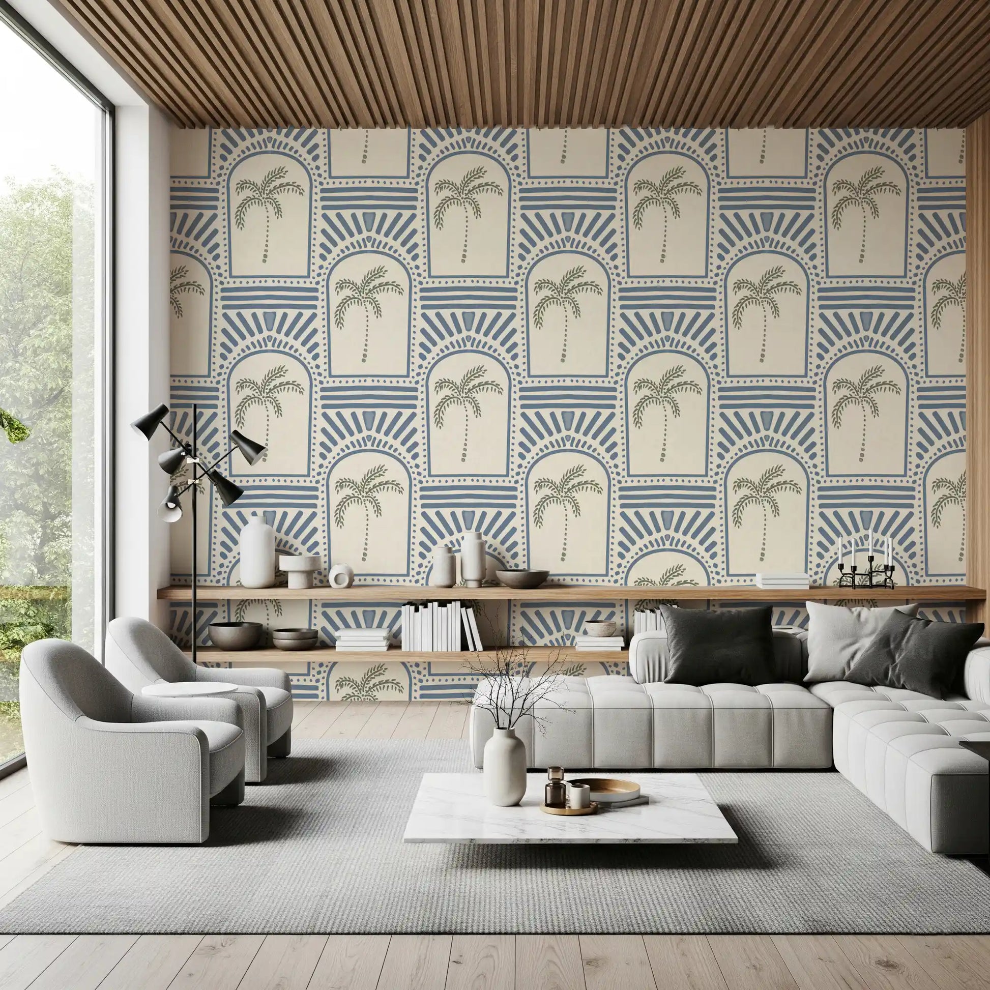 Tropical palm art deco archways slate blue wallpaper inside a modern living room.