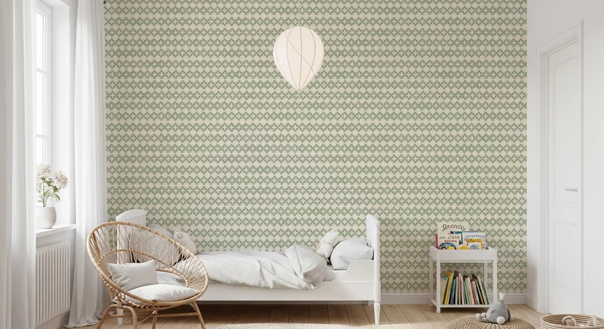 Woven cream texture warms the muted green in this Zellige Ornament wallpaper