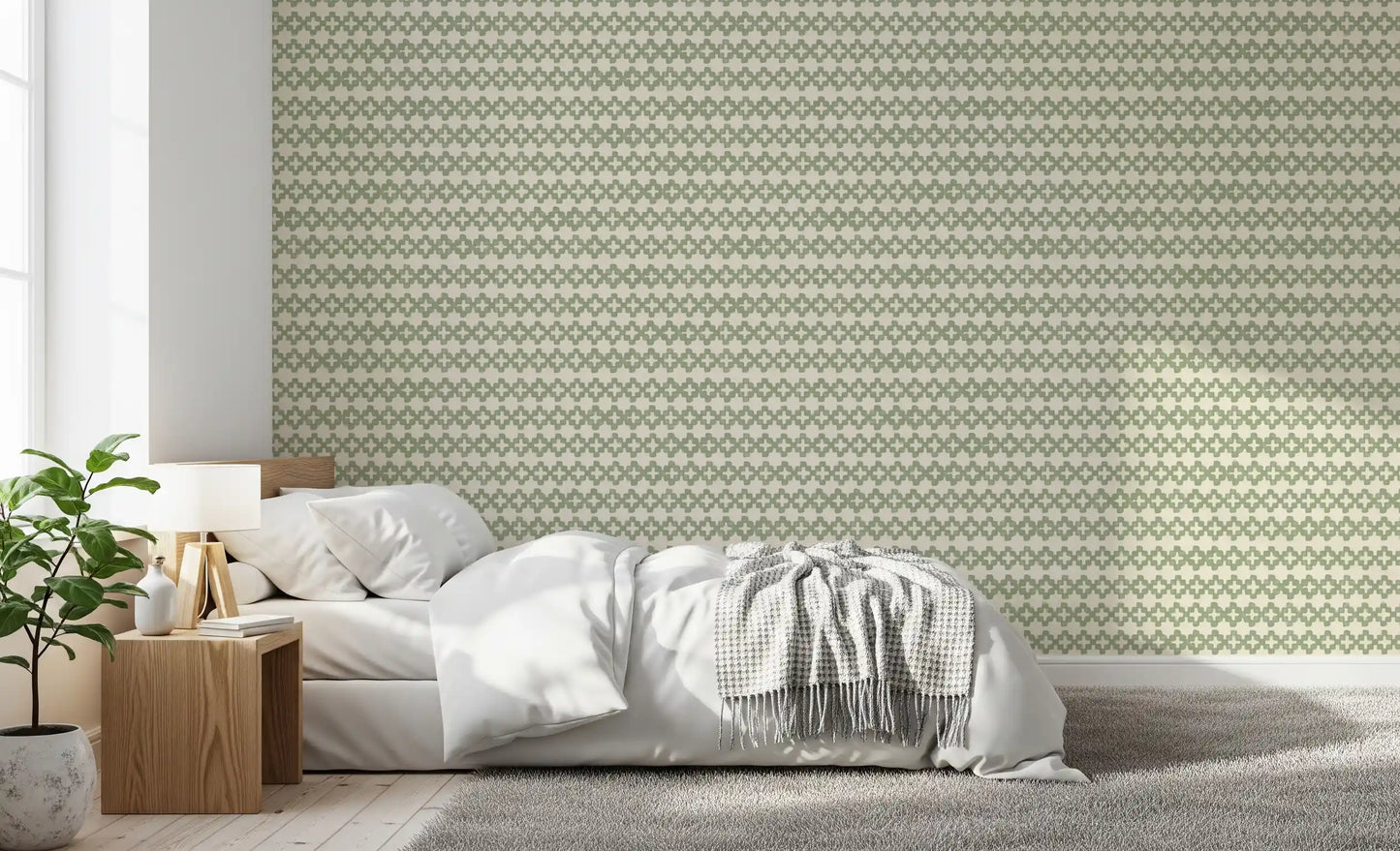 Plus-shaped motifs repeat in even rows on the Zellige Cross green wallpaper.