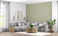 Restful living room scheme lifted by the Zellige Cross green wallpaper.