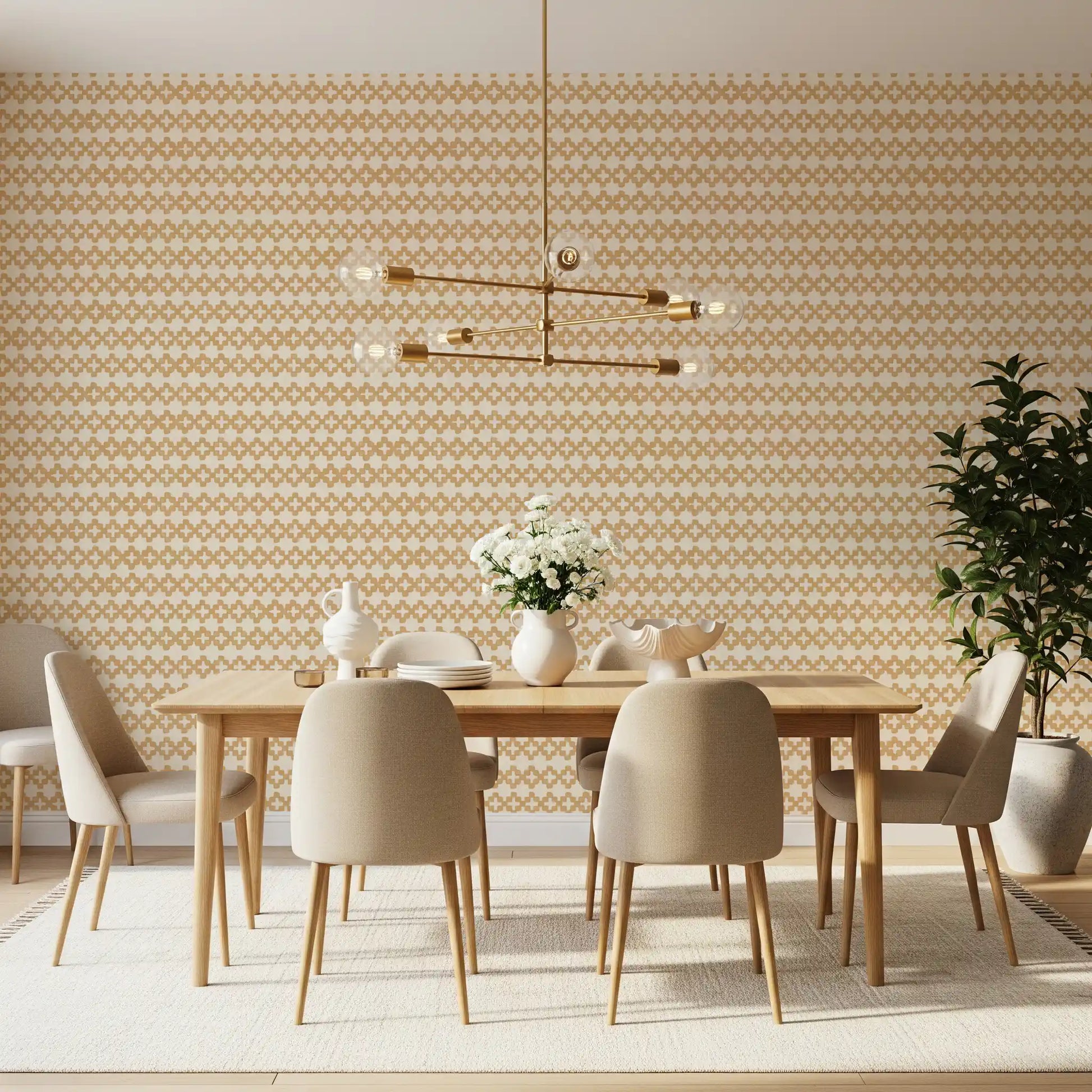 Warm dining room paired with the Zellige Cross Sand wallpaper's plus motifs.