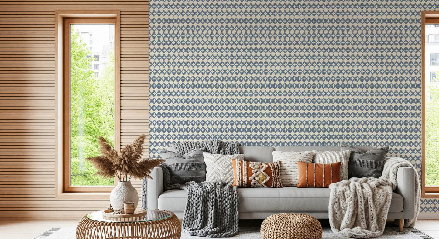 Rounded slate blue crosses link into rows on this zellige cross wallpaper