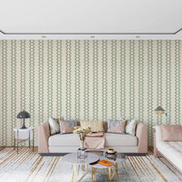 A calm living room scene backed by green ornament stripes wallpaper.