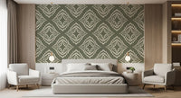 Ivory stippled marks form concentric diamonds on this palm green wallpaper