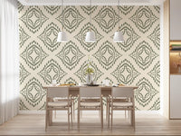 Detail view of green brush-like marks forming nested diamond wallpaper shapes