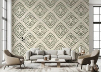 Palm green block ornament wallpaper sets a calm boho mood in a bright living room