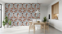 Folk woodland detail keeps a kitchen-dining nook warm in owl wallpaper