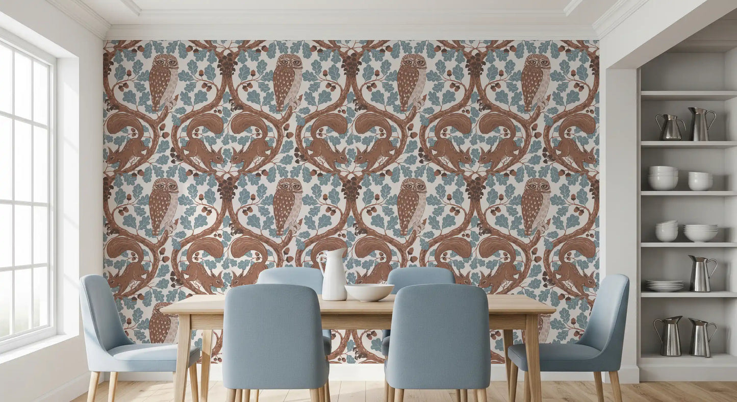 Two squirrels climb oak boughs above the central owl on this wallpaper