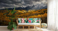 Dramatic storm clouds crown the peaks in this Golden Embrace autumn wall mural
