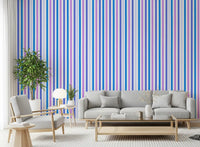 Living room styled with blue and lilac vertical stripe wallpaper for a calm mood