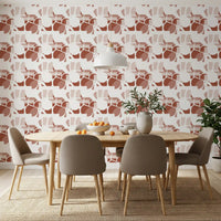 Rust and blush shapes scatter evenly across this clay shapes wallpaper pattern