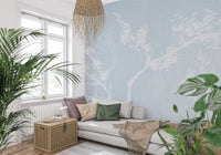 A pale blue ground fades behind the Ethereal Blossom wall mural branches.