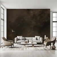 Faint branches surface from deep shadow in this moody wall mural