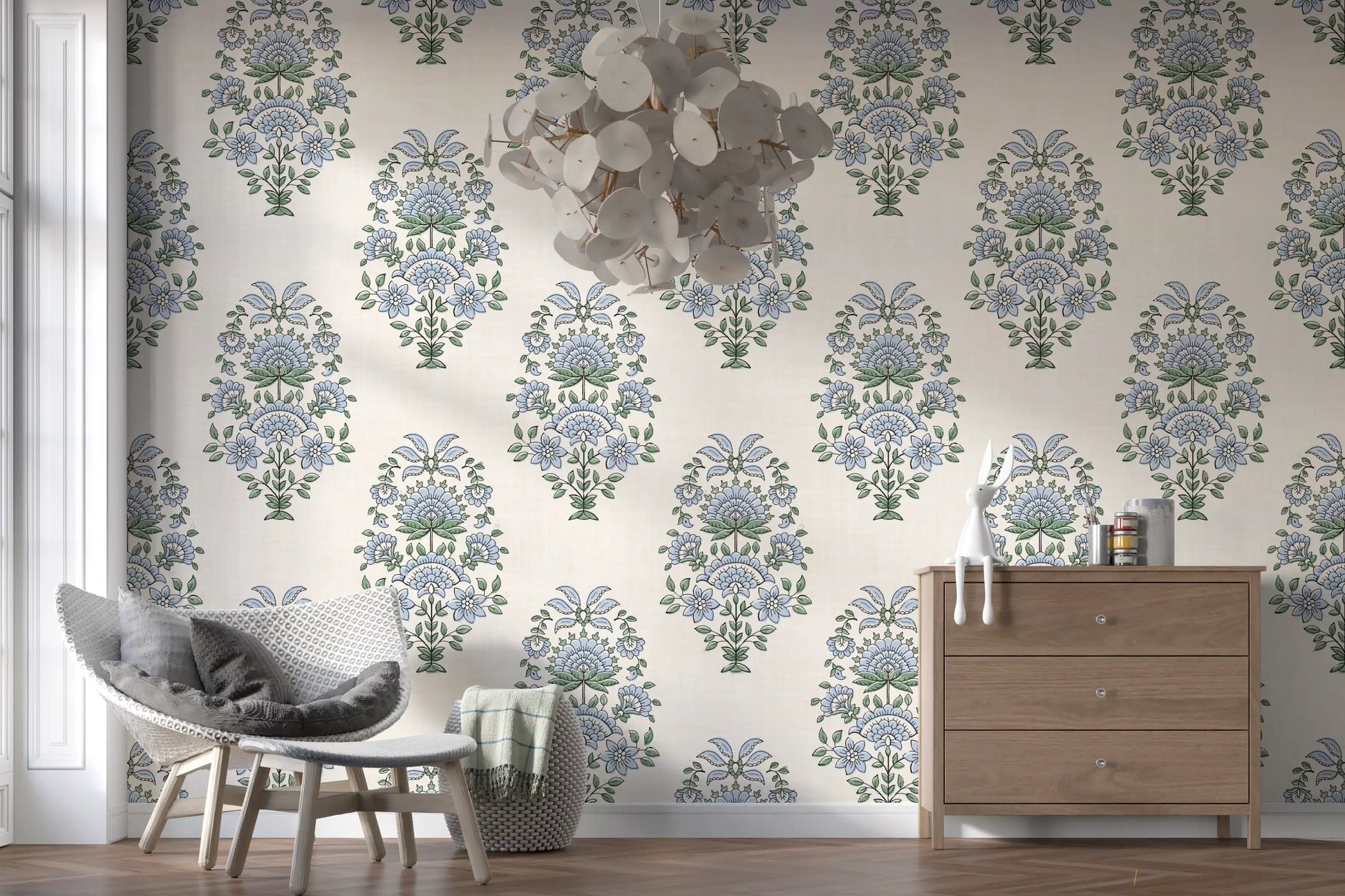 Periwinkle petals and sage leaves detailed in this serene floral wallpaper
