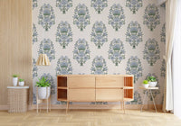 Pale cream ground keeps Serene Blue Floral Motif Wallpaper light and calm