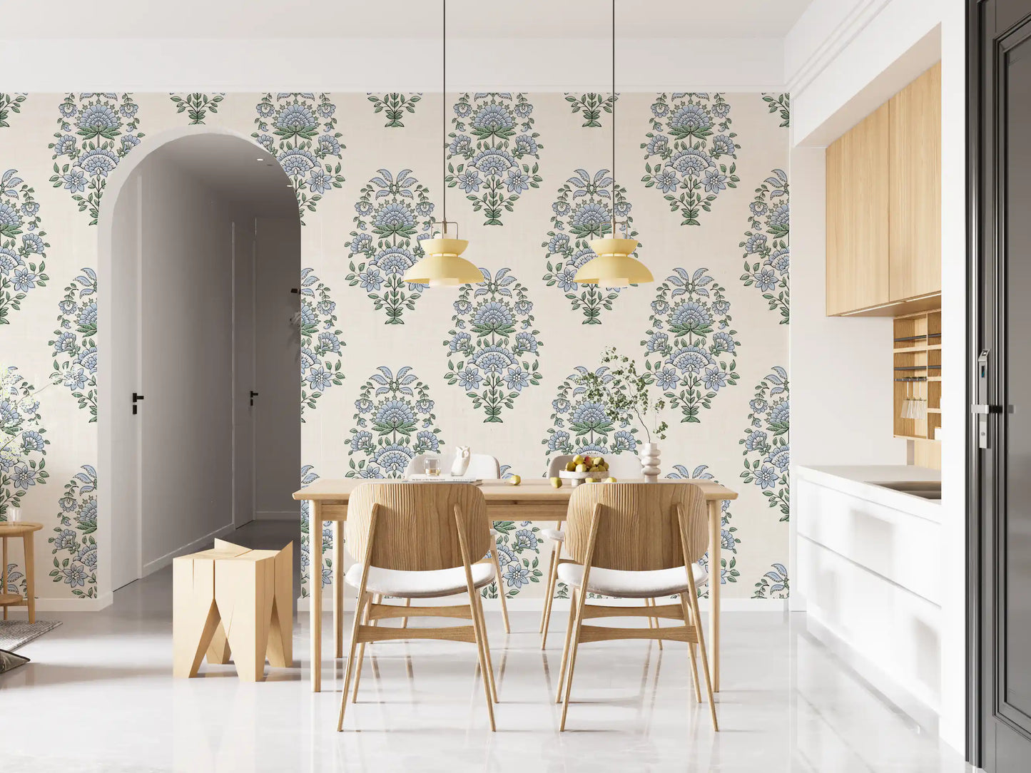 Periwinkle blooms wrap a dining room in this serene floral wallpaper