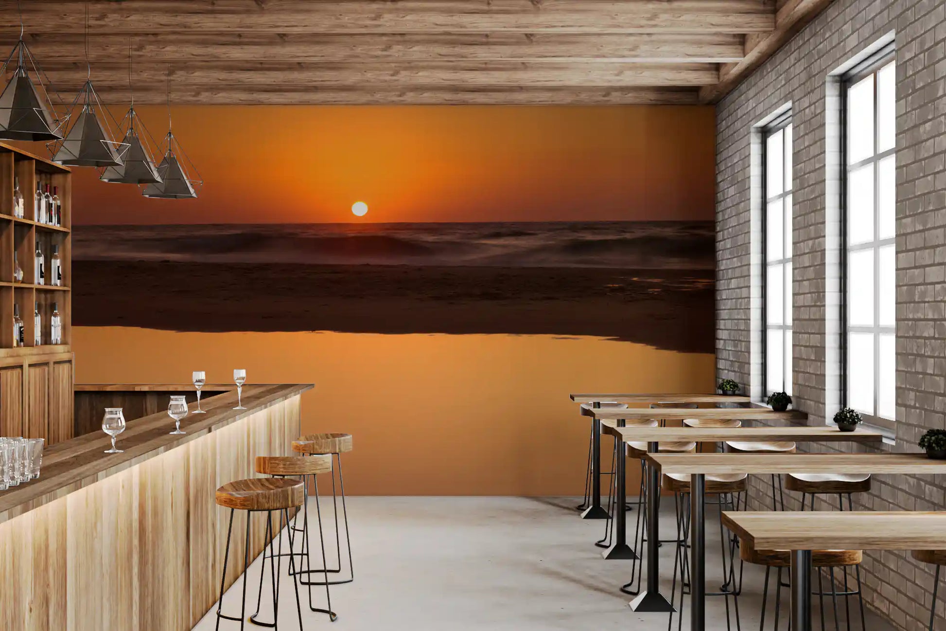 Café and restaurant warmed by the amber Golden Ocean Horizon wall mural backdrop.