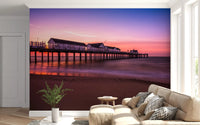 Smooth pink and violet tones blend across the Sunset Pier wall mural.