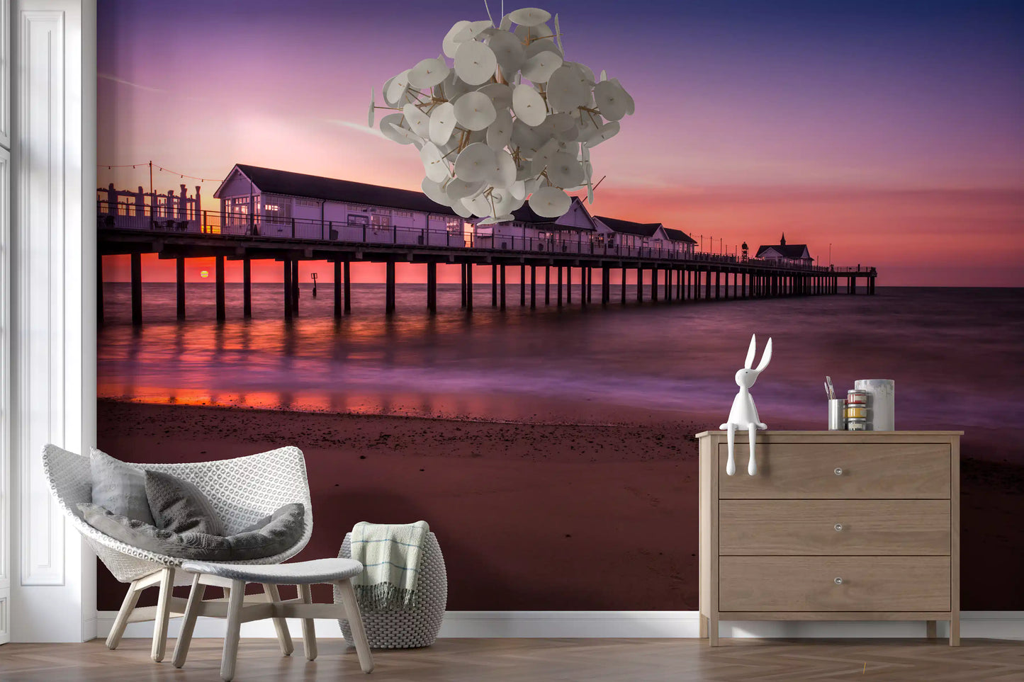 Hallway finished with the soft coastal Sunset Pier wall mural at dusk.