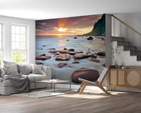 Coastal Sunset Serenity wall mural showing a rocky shore under a glowing sky