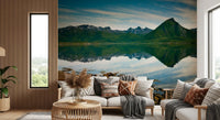 Mirror-still water gives a living room depth with the Emerald Peaks wall mural.