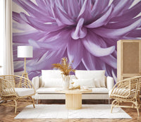 A pale lilac flower wall mural glows behind a relaxed sitting room setting