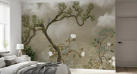 Small blue bird resting on a low branch of the pine wall mural