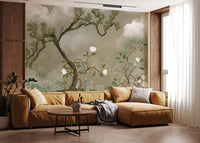 Pine and blossom wall mural framing a Living room with a misty taupe backdrop