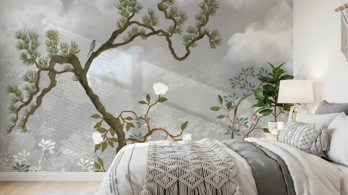 A misty chinoiserie pine wall mural set behind a calm bedroom palette
